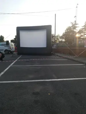 a large white screen sitting in a parking lot at 2013 Willerby Sunset Static Caravan Holiday Home in Clacton-on-Sea