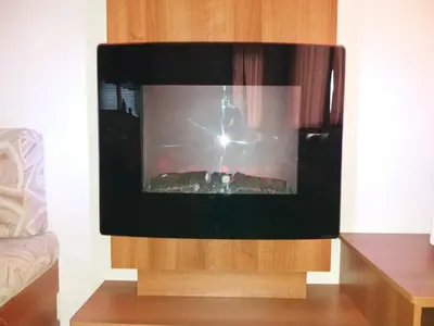 a flat screen tv sitting in a living room at 2013 Willerby Sunset Static Caravan Holiday Home in Clacton-on-Sea