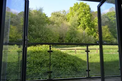 an open window with a view of a field at 360 Serviced Accommodations - Brentwood 2 Bedroom Executive Apartment with Secure Parking in Brentwood