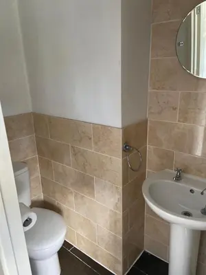 a bathroom with a toilet and a sink at The Ram Inn in Brandon