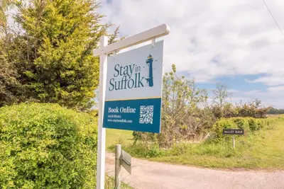 a sign for a stayatown study on a roadroute at Granary Cottage, Valley Farm, Snape in Saxmundham