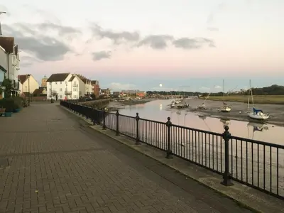 a body of water with boats in it at Curlew in Brightlingsea