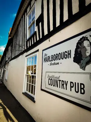 a sign on the side of a building at The Marlborough Dedham in Dedham