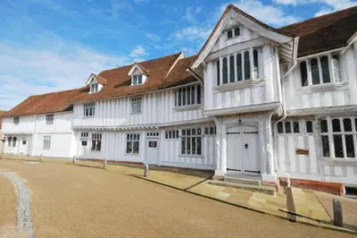 a large white building with a brown roof at 6 Bed in Great Waldingfield oc-ac4 in Great Waldingfield