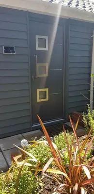 a door to a house with plants in front of it at Lauriston Stay in Birch