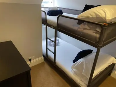 a couple of bunk beds in a room at Elizabeth Clark in Manningtree