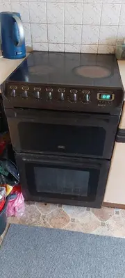 a stove top oven sitting on top of a counter at Basildon House of Muralist in Basildon