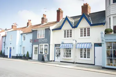 a row of buildings on a city street at Bunny Cottage, Aldeburgh in Aldeburgh