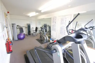 a gym with several treadmills and cardio machines at Saffron, Blythview in Blythburgh