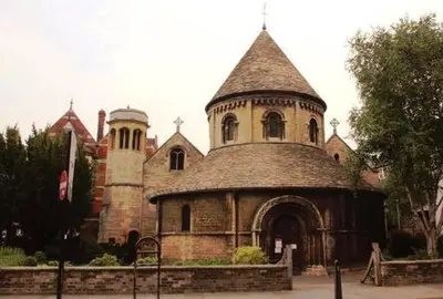 an old building with a tower and a church at Quaint 2 bed Cottage in the Heart of Cambridge in Cambridge