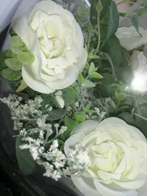 a bouquet of white roses with green leaves at 59 Halstead - Gorgeous single bedroom with private bathroom in Halstead