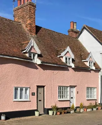 a pink house with a brown roof at Almond Cottage Clare - 2 bedroom English Cottage in Clare