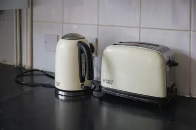 a toaster sitting on top of a kitchen counter at Summer Deal 20 PRC OFF 4BR 2BATH Families Groups By Trinity Stays Short Lets & Serviced Accommodation Cambridge in Cambridge