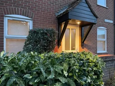 a house with a bunch of plants in front of it at Pedlars Rest in Swaffham