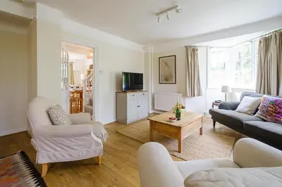 a living room with two couches and a coffee table at 9 Whinlands in Thorpeness