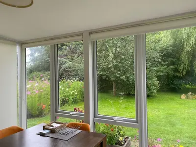 a window in a room looking out at a garden at The Garden Cottage, Wenhaston, Suffolk, near coast in Halesworth