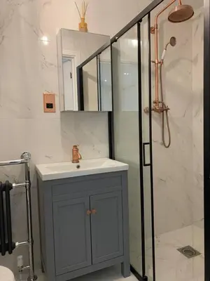 a bathroom with a sink and a shower at Bury St Edmunds - Apartment - Sleeps 2 - Parking in Bury Saint Edmunds