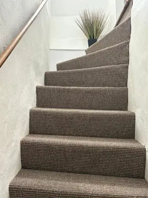 a stairway with a potted plant on it at Stylish Town House in Medieval Grid in Bury Saint Edmunds
