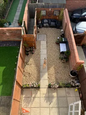an overhead view of a garden with benches and flowers at Stylish 3 bedroom townhouse for 5 guests, set in the medieval grid with off street parking in Bury Saint Edmunds