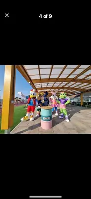 a group of cartoon characters standing under a building at Stylish 3 Bedroom caravan near the Beach in Walton-on-the-Naze