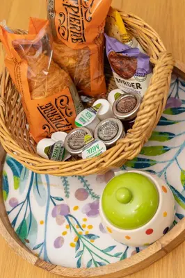 a basket filled with food on top of a table at The Lodge at Highlands in Everton