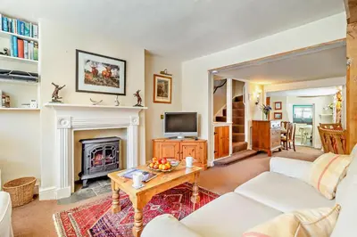 a living room with a fireplace and a television at 2 Bed in Yoxford oc-c27253 in Wickham Market