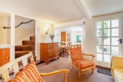 a living room with two chairs and a table at 2 Bed in Yoxford oc-c27253 in Wickham Market