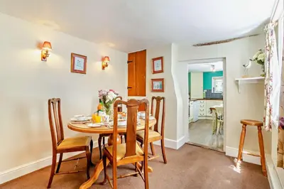 a kitchen and dining room with a table and chairs at 2 Bed in Yoxford oc-c27253 in Wickham Market