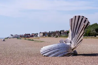 a shell sitting on a sandy beach at 2 Bed in Aldeburgh oc-sfdar in Aldeburgh