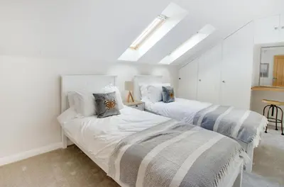 two beds in a room with white walls at 2 Bed in Newton oc-swro in Sudbury