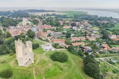 an aerial view of a small town with a castle at 2 Bed in Orford oc-sflpo in Orford