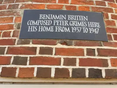 a sign on the side of a brick wall at 2 Bed in Snape oc-sfoms in Snape