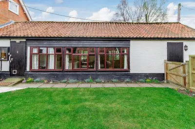 a house with a green lawn in front of it at 1 Bed in St. James South Elmham Halesworth oc-t27361 in Saint James